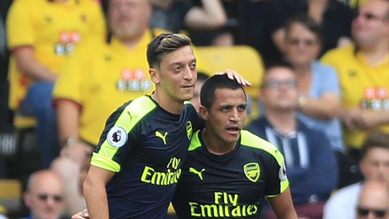 Arsenal's Alexis Sanchez (right) celebrates with team-mate Mesut Ozil
