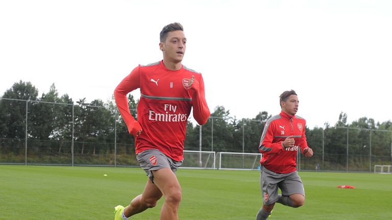 Mesut Ozil (left) and Ismael Bennacer in pre-season training with Arenal