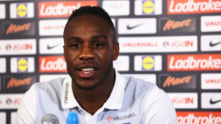 Michail Antonio of England talks during the England Press Conference at St George's Park on August 30, 2016 in Bur