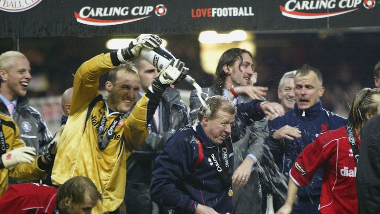 Middlesbrough players celebrate with manager Steve McClaren after their win over in the Carling Cup Final match at The Millennium Stadium in February 2004