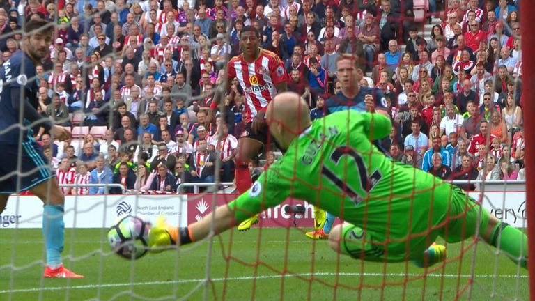 Brad Guzan makes a save from Patrick van Aarnholt during Middlesbrough's match with Sunderland.