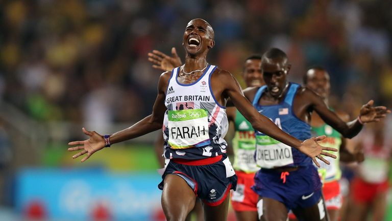 Great Britain's Mo Farah celebrates winning the 5000m 