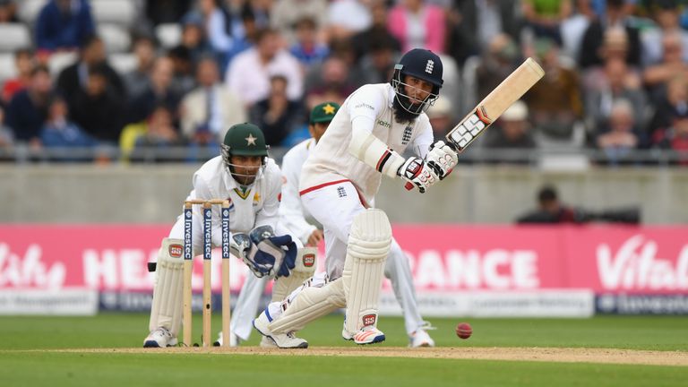 England batsman Moeen Ali hits out watched by Sarfraz Ahmed during day one of the 3rd Investec Test