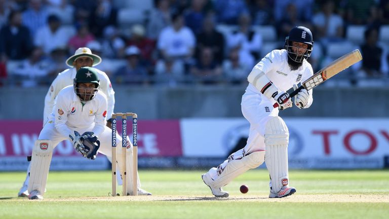 England's Moeen Ali works the ball through mid-wicket