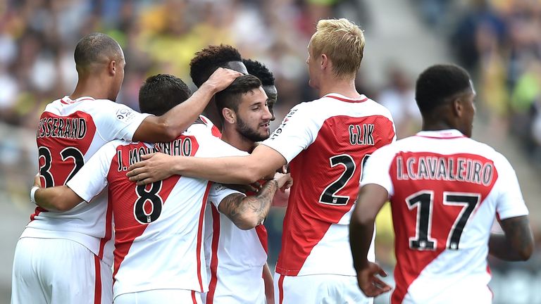 Monaco's Brazilian mildfielder Gabriel Boschilia (C) is congratulated after scoring by his teammates during the French L1 football match between Nantes and