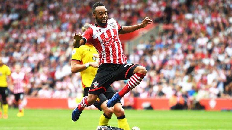 Watford 'keeper Heurelho Gomes saves at the feet of Southampton's Nathan Redmond