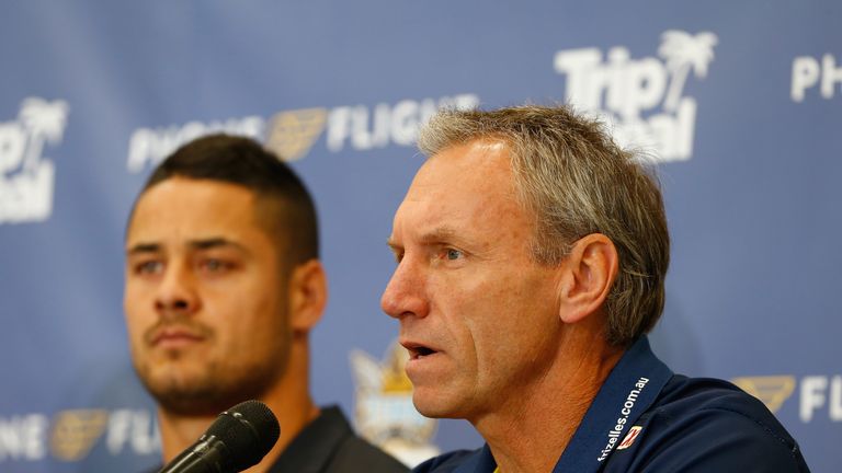 GOLD COAST, AUSTRALIA - AUGUST 03:  Jarryd Hayne with Titans coach Neil Henry during a press conference at Gold Coast Airport on August 3, 2016 in Gold Coa