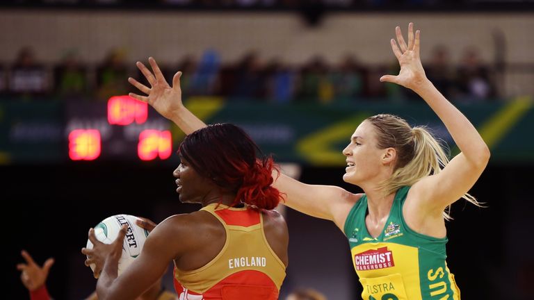 ADELAIDE, AUSTRALIA - AUGUST 31:  Caitlin Bassett of the Diamonds tries to block a pass by Ama Agbeze of the Roses during the International Test match betw