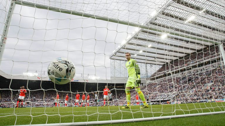 Brighton goalkeeper David Stockdale watches Jonjo Shelvey's stunning free-kick fire into the back of the net