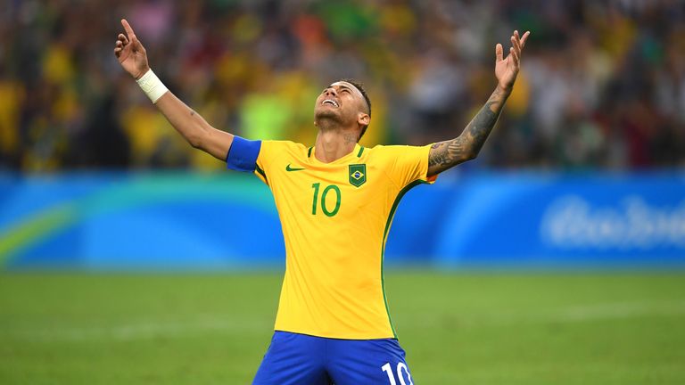 Neymar celebrates his gold medal-winning penalty