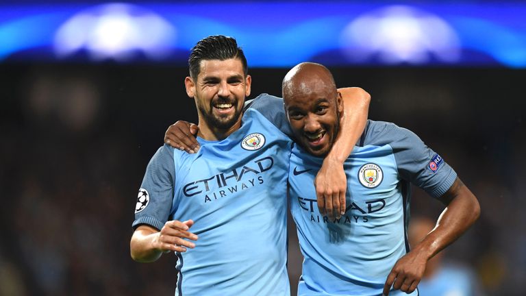 Fabian Delph (R) celebrates with Nolito after scoring the opening goal of the game