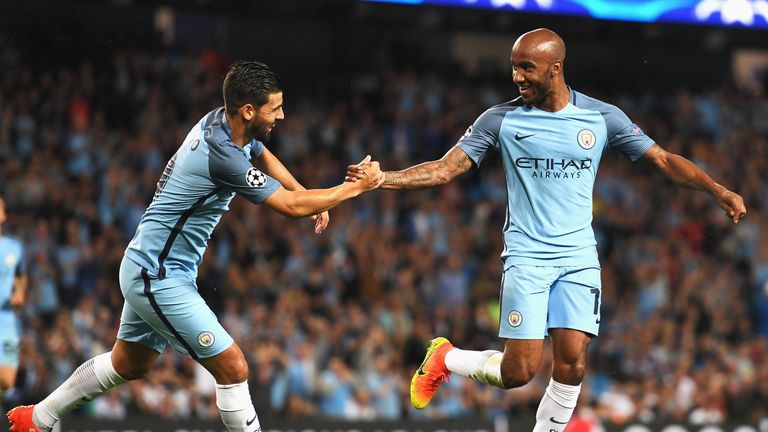 Fabian Delph (R) celebrates with Nolito after scoring the opening goal