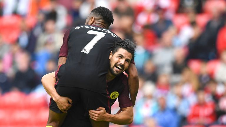 Nolito (R) celebrates his goal with team-mate, Raheem Sterling