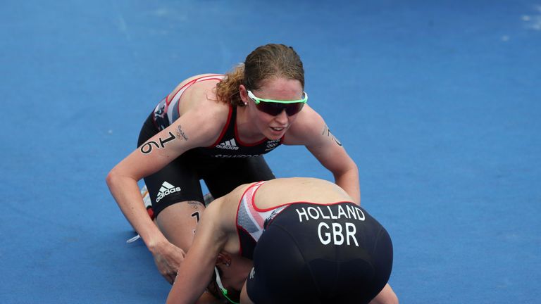 Non Stanford and Holland embrace after the triathlon