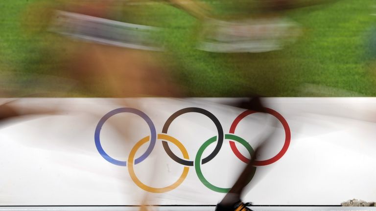 Athletes run during the women's 10,000m final at the National stadium as part of the 2008 Beijing Olympic Games