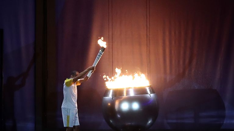 RIO DE JANEIRO, BRAZIL - AUGUST 05:  The Olympic Cauldron is lit by the final torch bearer and former marathon runner Vanderlei Cordeiro de Lima during the