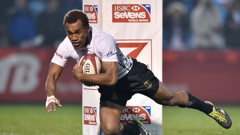 Fiji's Osea Kolinisau scores a try against Canada 