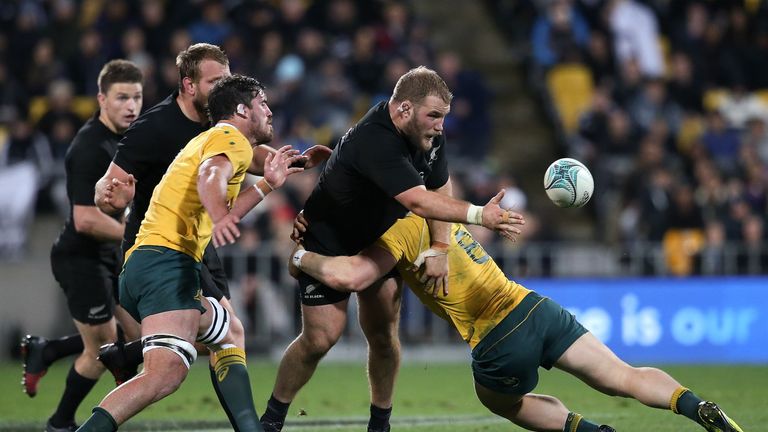 Owen Franks offloads the ball during his side's 29-9 win over Australia