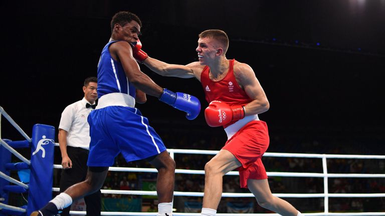 Great Britain's Pat Mccormack (right) punches Cuba's Yasnier Toledo during the Men's Light Welter (64kg) match at the Rio 2016 Olympic Games