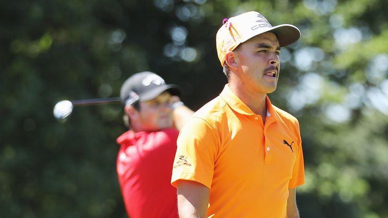 FARMINGDALE, NY - AUGUST 28:  Patrick Reed hits his tee shot on the second hole as Rickie Fowler looks on during the final round of The Barclays in the PGA