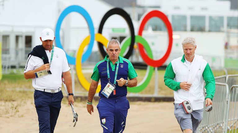 Paul McGinley with Padraig Harrington and Harrington's caddie Ronan Flood  during a practice round in Rio