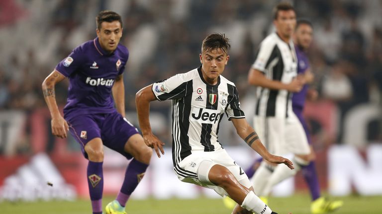 Juventus' forward Paulo Dybala from Argentina controls the ball during the Italian Serie A football match between Juventus and Fiorentina on August 20, 201