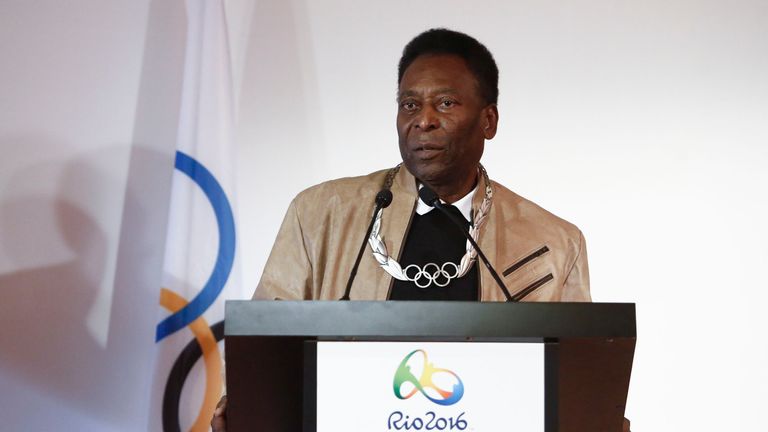 Pele speaks after being decorated with an Olympic Order Medal at the Pele Museum