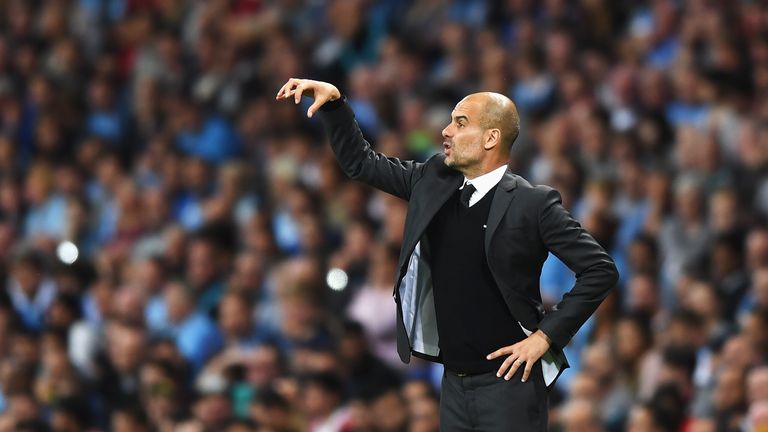 MANCHESTER, ENGLAND - AUGUST 24:  Josep Guardiola, Manager of Manchester City gives instructions during the UEFA Champions League Play-off Second Leg match