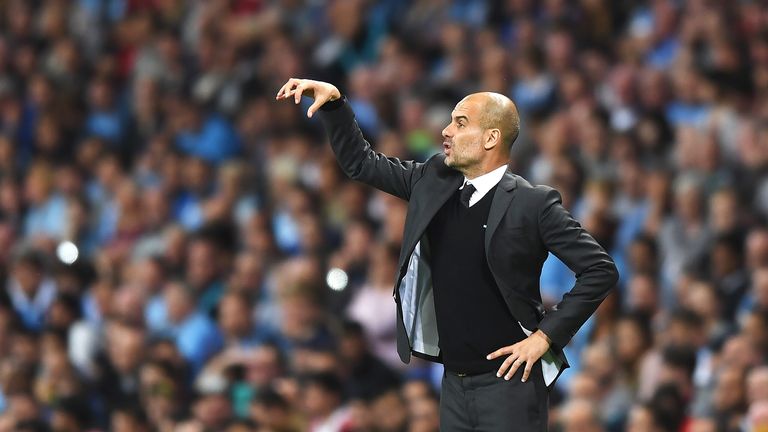 Pep Guardiola gives instructions during the UEFA Champions League Play-off Second Leg