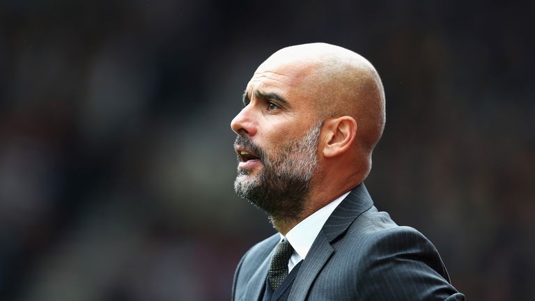 Josep Guardiola looks on during the game