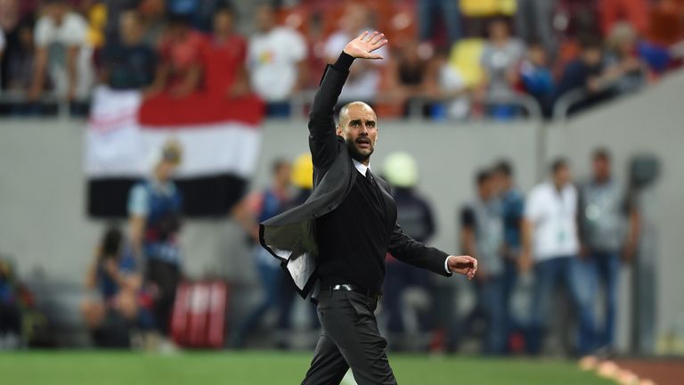 Coach Josep Guardiola of Manchester City celebrates victory after the UEFA Champions league first leg play-off football match between Steaua Bucharest and 