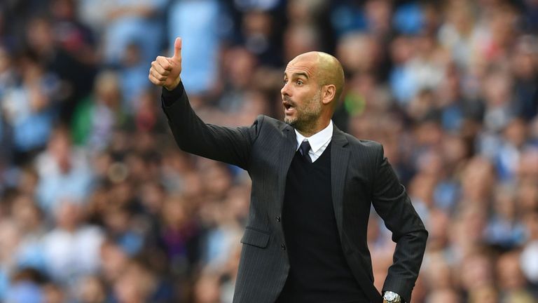 Manchester City's Spanish manager Pep Guardiola gestures from the touchline during the English Premier League football match between Manchester City and Su