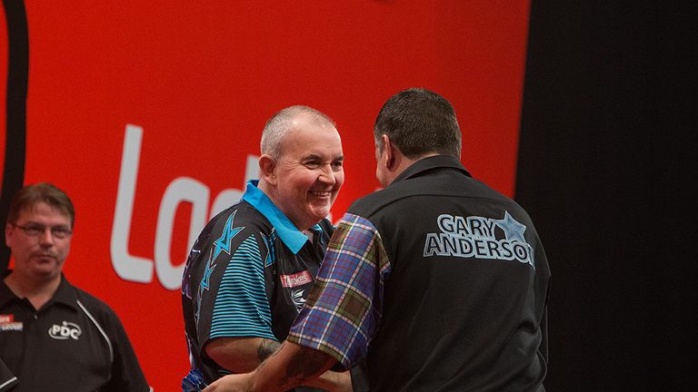 Phil Taylor action during their quarter final match between Phil Taylor and Gary Anderson