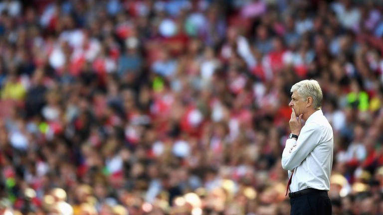 Arsene Wenger looks on during Arsenal's match with Liverpool
