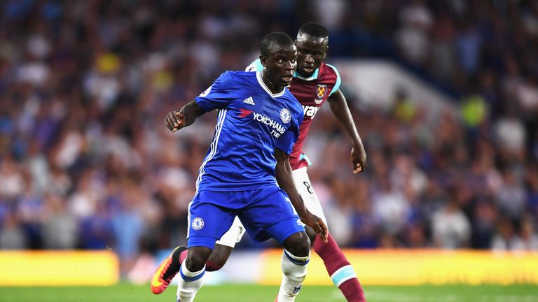 N'Golo Kante (L) is closed down by Cheikhou Kouyate