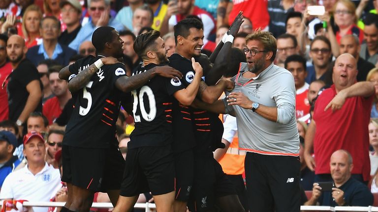 Sadio Mane and team mates celebrate his goal with Jurgen Klopp