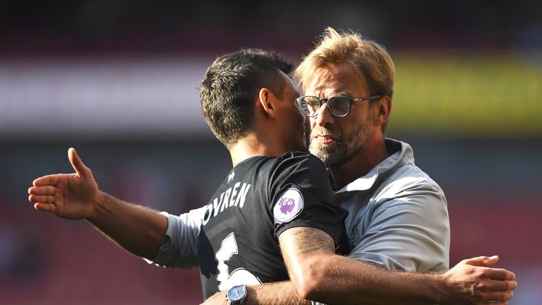 Manager Jurgen Klopp (R) and defender Dejan Lovren celebrate defeating Arsenal