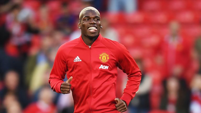 Paul Pogba warms up prior to kick-off at Old Trafford