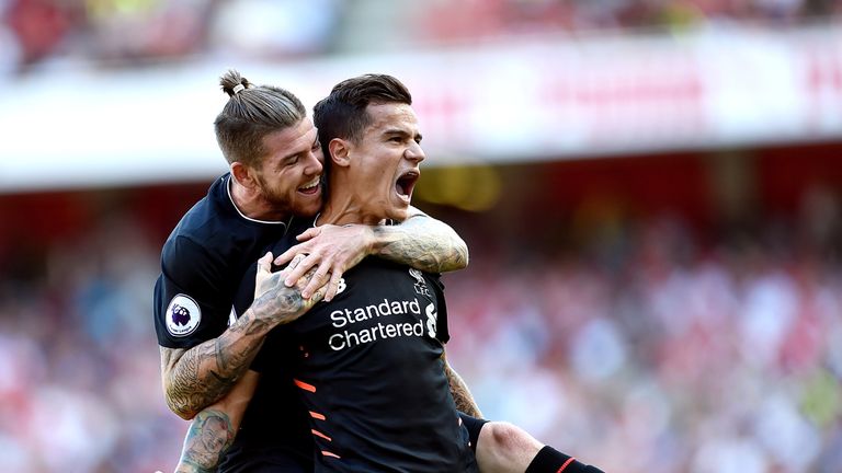 Philippe Coutinho celebrates after scoring the equalising goal