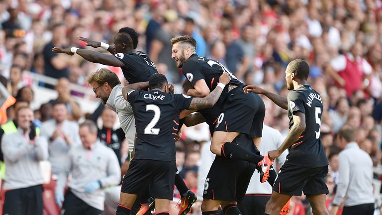 Sadio Mane celebrates with manager Jurgen Klopp after scoring Liverpool's fourth goal