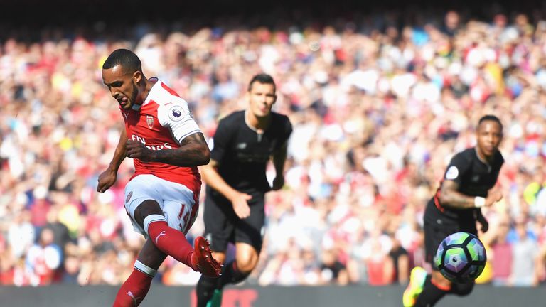 Theo Walcott misses from the penalty spot