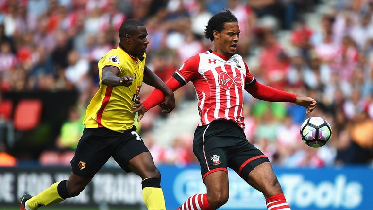 SOUTHAMPTON, ENGLAND - AUGUST 13: Virgil van Dijk of Southampton battle for possession with Odion Ighalo of Watford during the Premier League match between