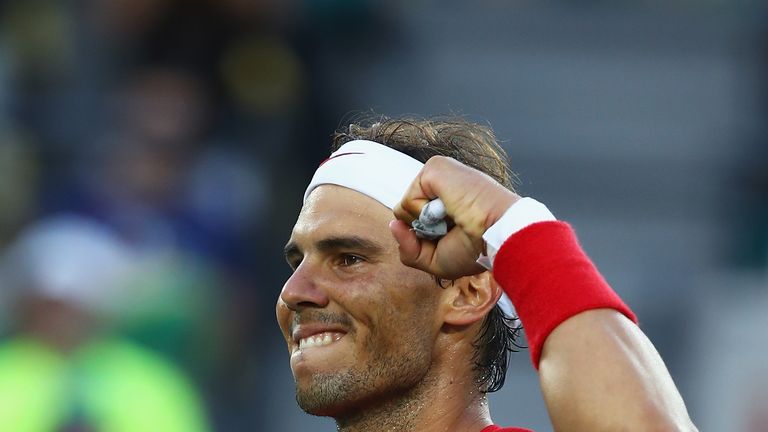 RIO DE JANEIRO, BRAZIL - AUGUST 12:  Rafael Nadal of Spain celebrates match point against Thomaz Bellucci of Brazil in the Men's Singles Quarterfinal on Da