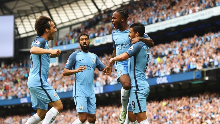 MANCHESTER, ENGLAND - AUGUST 28:  Raheem Sterling of Manchester City celebrates scoring the opening goal with Nolito, Gael Clichy (2ndL) and David Silva (L