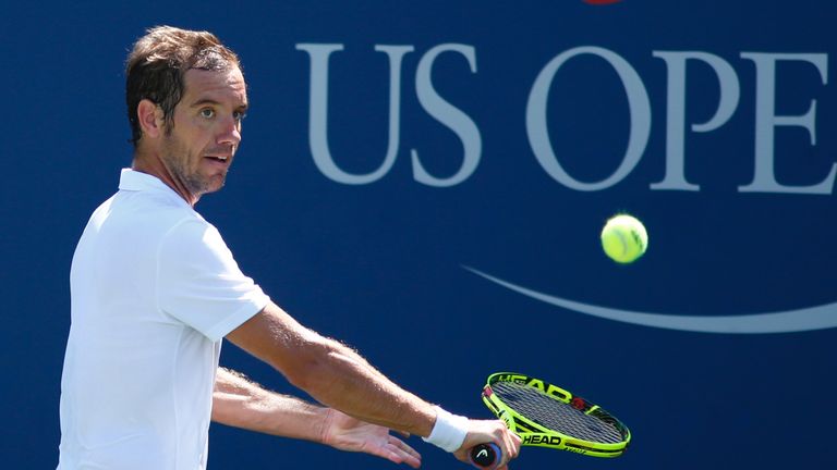 Richard Gasquet of France hits a return to Kyle Edmund of United Kingdom during their 2016 US Open Men's Singles Round 1 match at the USTA Billie Jean King