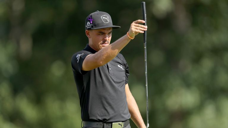 Rickie Fowler kept a bogey off his card and goes into the weekend two behind Reed