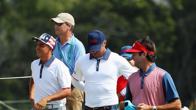 RIO DE JANEIRO, BRAZIL - AUGUST 09:  Rickie Fowler, Matt Kuchar and Bubba Watson of the United States walk down a fairway with Gil Hanse during a practice 