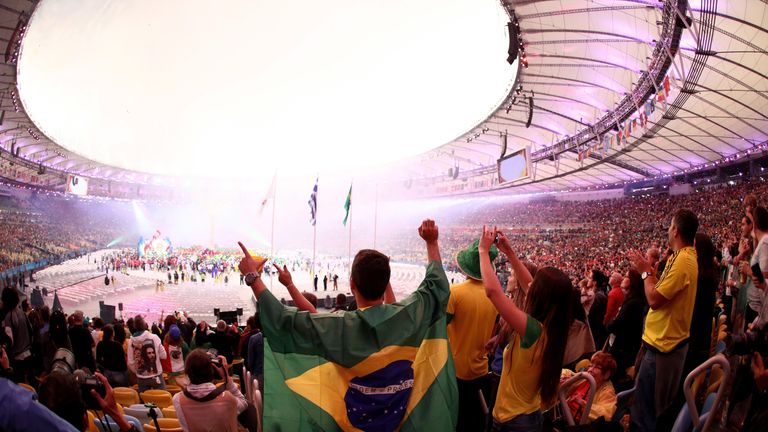 Spectators are mesmerised by the light show during the closing ceremony