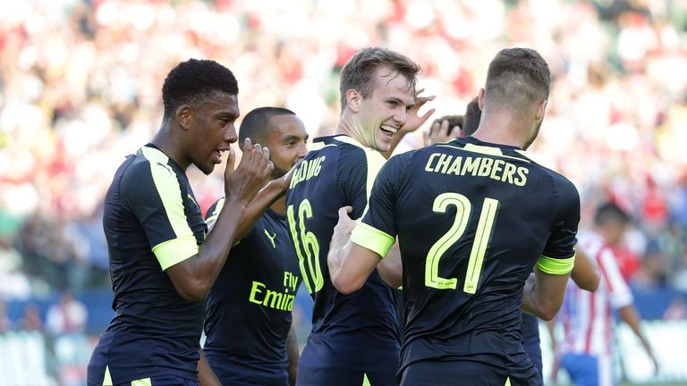 CARSON, CA - JULY 31:  (L-R) Alex Iwobi #17, Theo Walcott #14, Rob Holding #16 and Calum Chambers #21 of Arsenal celebrate Holding's first half goal agains