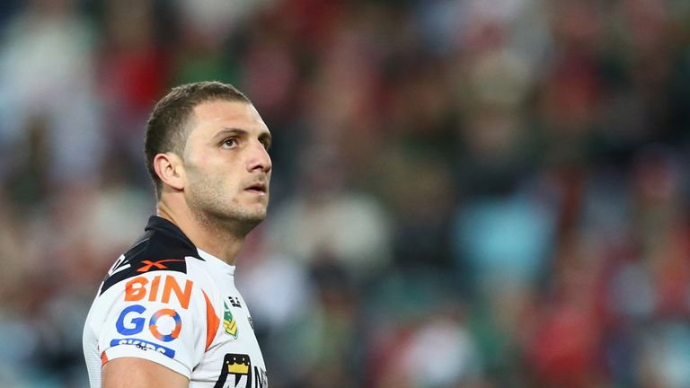 Robbie Farah of the Tigers looks dejected as he looks up at the big screen during the round 10 NRL